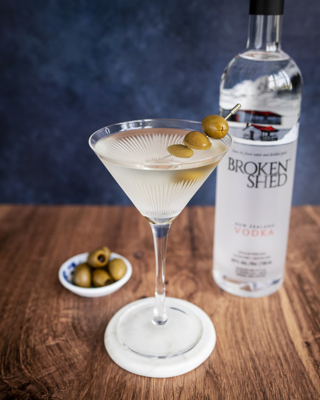 A Broken Martini cocktail with olives